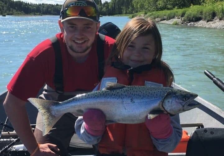 IMG_0455-c5d0c52f father and daughter holding a fresh caught salmon